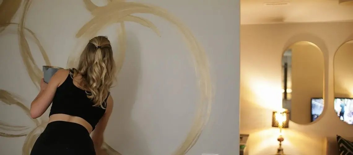 A wall painting being made in apartment 203